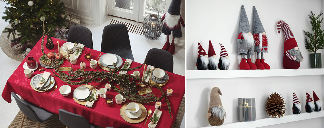 Tavolo da pranzo decorato per Natale con albero di Natale ed elfi