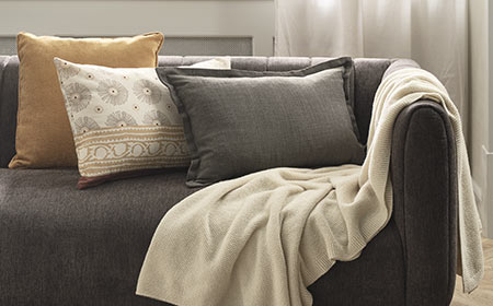 I tessuti per la casa preferiti della nostra Buyer: cuscini, coperte e accessori cozy