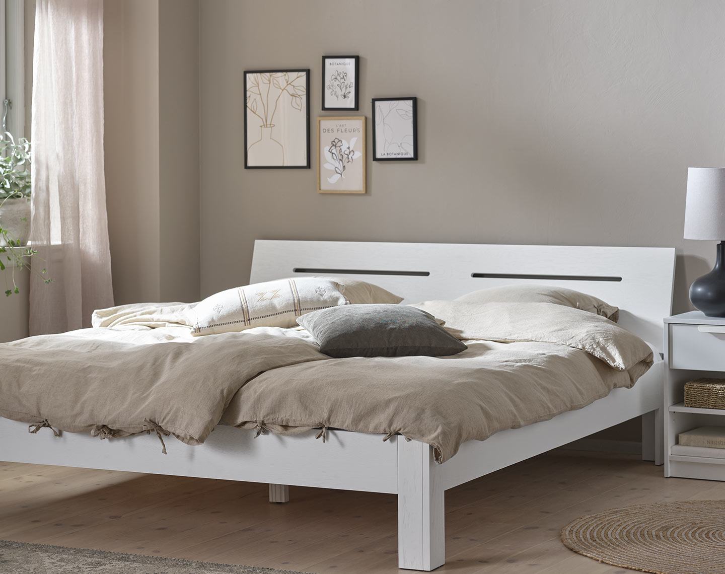 Struttura letto in legno bianco