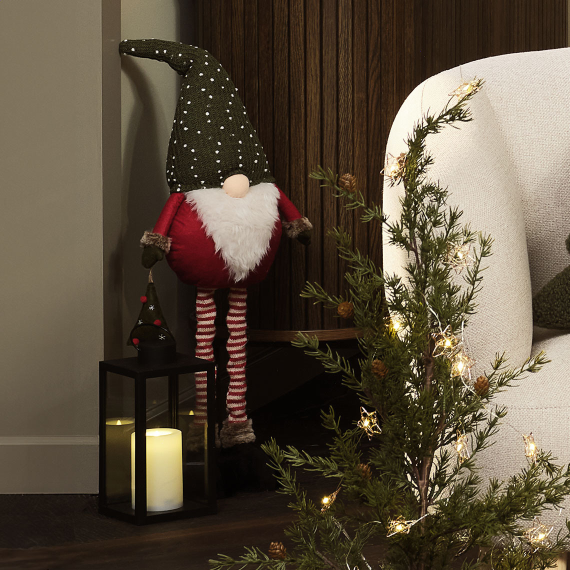 Elfo natalizio alto con gambe regolabili