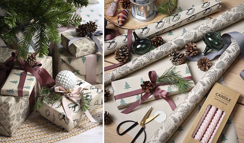 Regali di Natale decorati con palline natalizie, rametti e pigne.