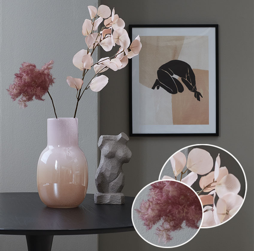 AGNER and SJUR artificial flowers and KASPER vase Vase with artificial flowers and a sculpture of female body on a table